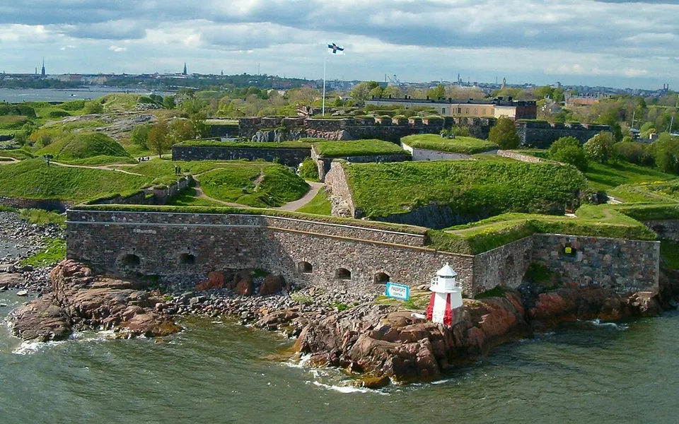 Suomenlinna , a fortress near Helsinki , Finland . Picture taken from a ferry.