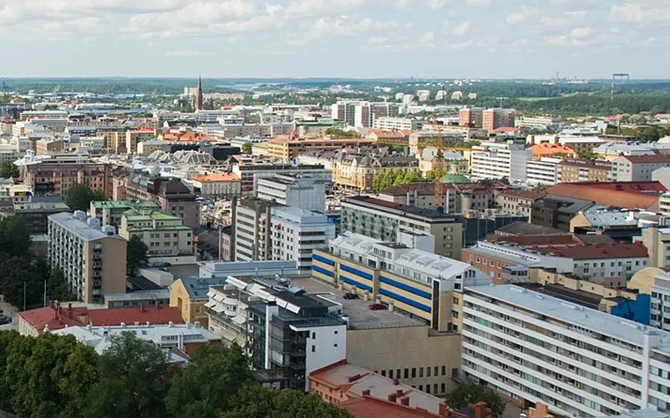 Turku as seen from the tower of Turku Cathedral . The photo mimics another photo taken in late 19th century .